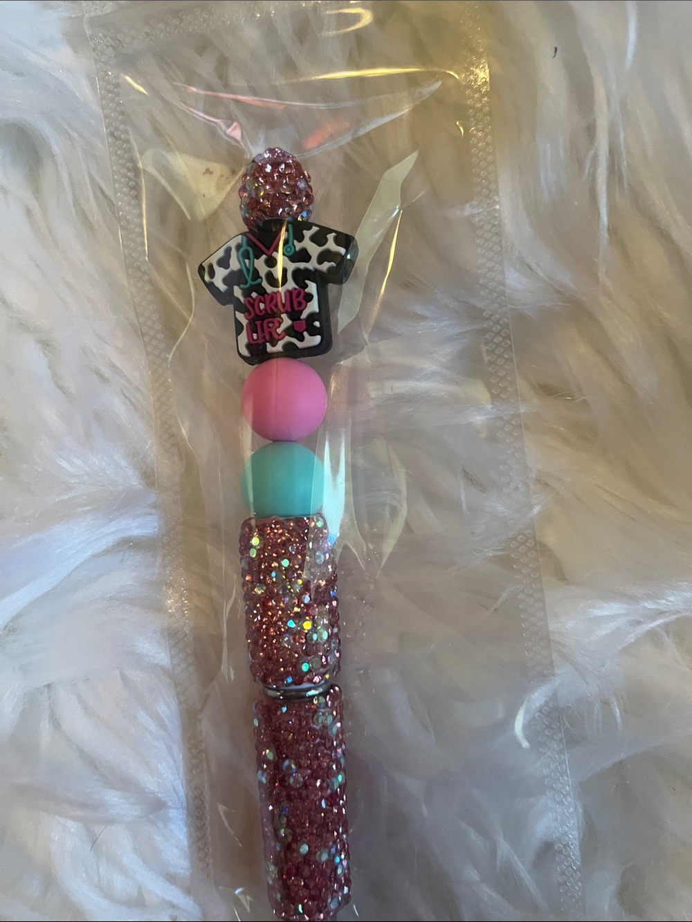 Pink & Teal Beaded Kids Accessory with scrub top